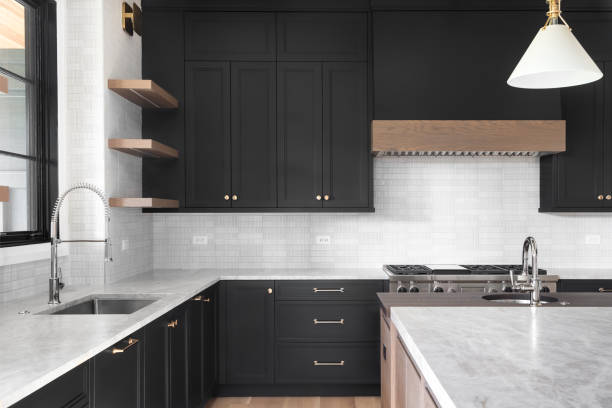 Black Cabinets with White Marble Countertops